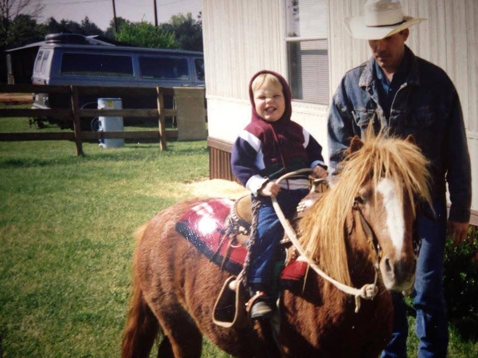 A small child led around on a first pony at the Hayes ranch
